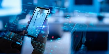 Individual analyzing data on smartphone