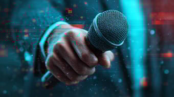  Earned media reporter holding microphone for knb communications PR client 