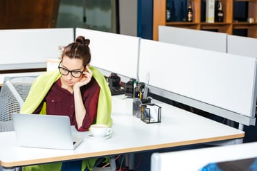 businesswoman-working-with-laptop-and-feeling-PKPA7T3-min