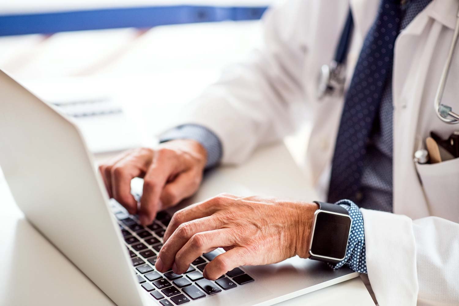 doctor-typing-on-computer_SS_website