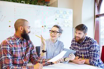 Multiethnic group of happy business people working together in the office.