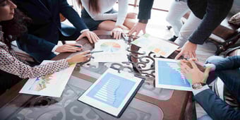 marketing team communicating and using metrics