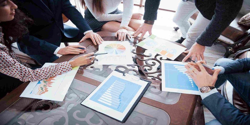 marketing team communicating and using metrics