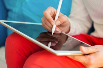 Healthcare marketing writing messaging on tablet