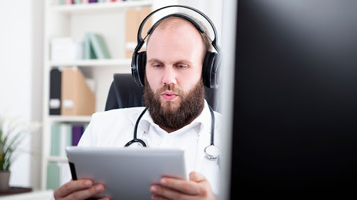 healthcare professional listening to healthcare podcast