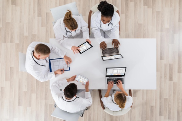 healthcare PR professionals working on PR campaign measuring KPIs