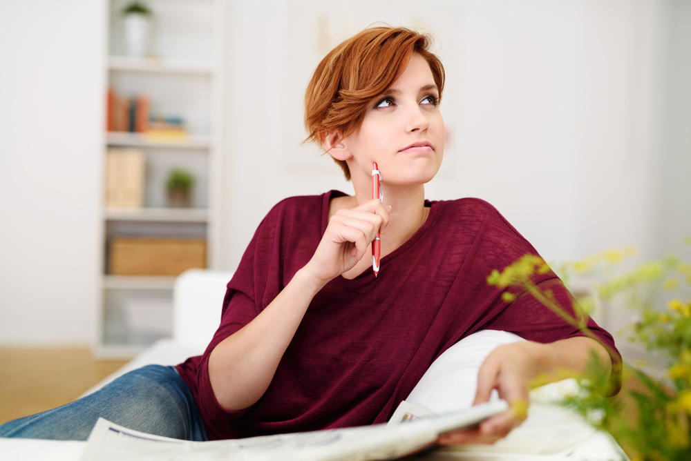 Young woman reflecting on her memories