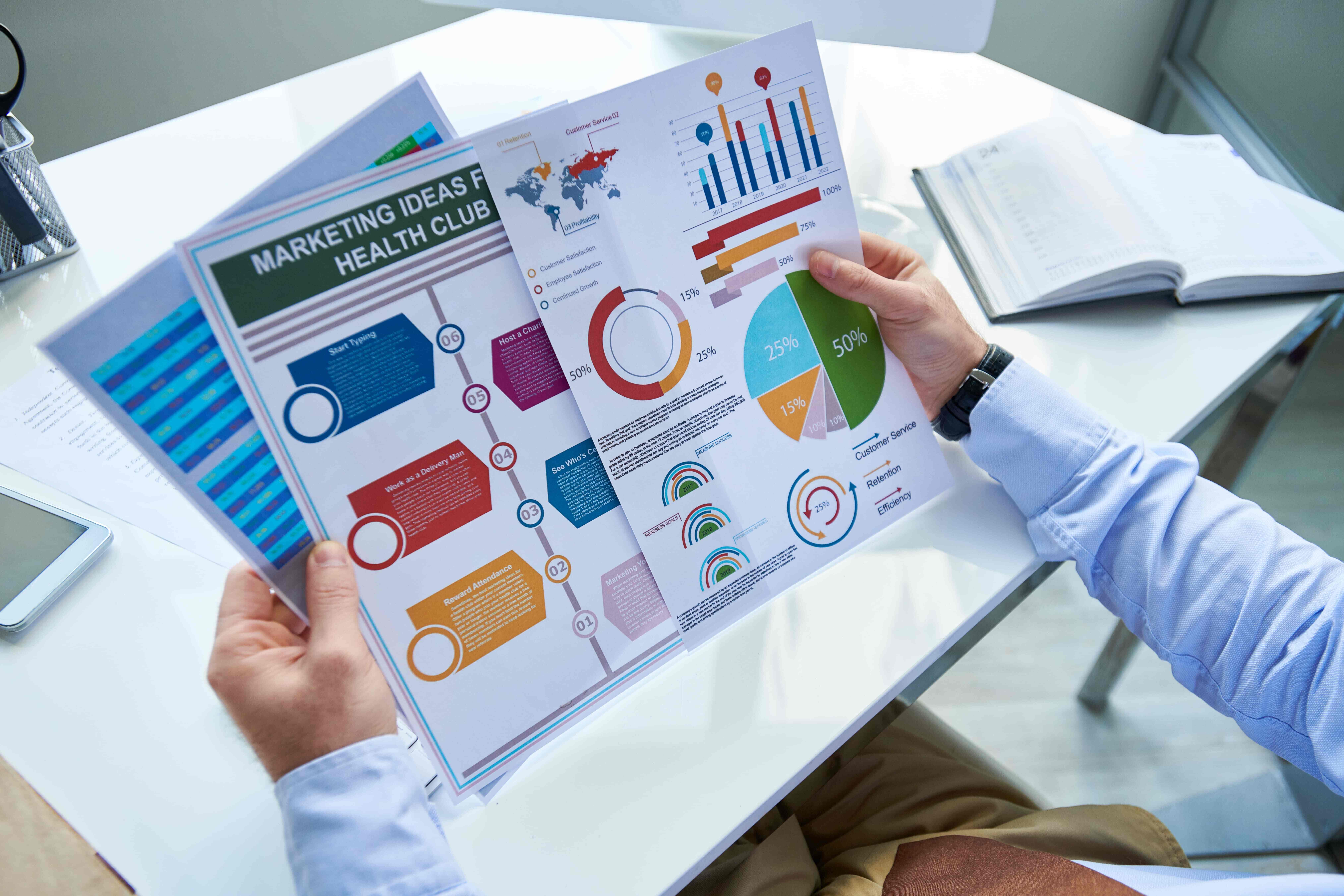 Marketer looking at colorful graphics