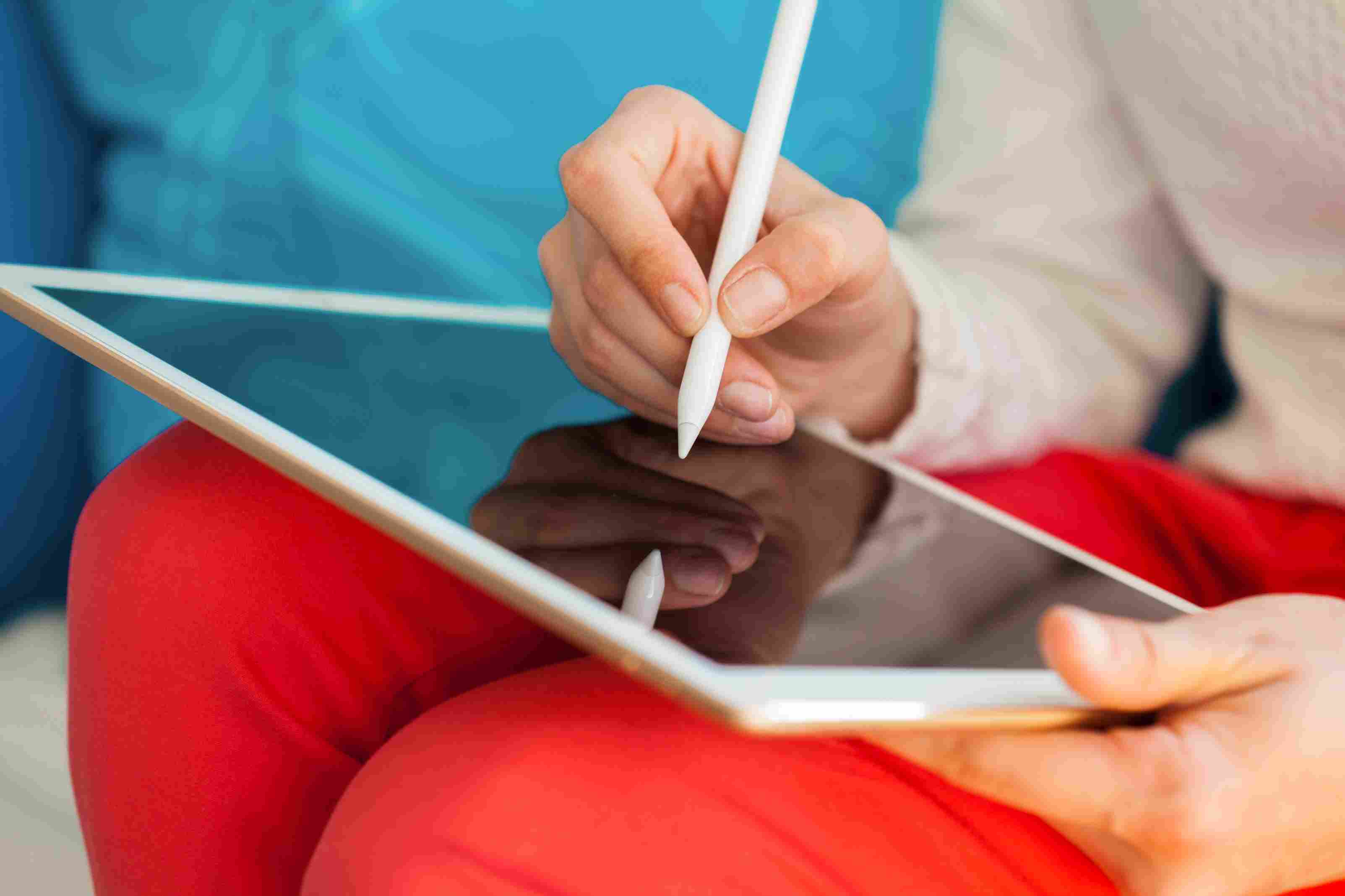 Healthcare marketing writing messaging on tablet
